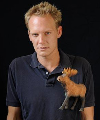 Jonathan Torrens with a moose on his polo shirt